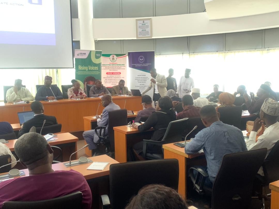 Presentation projected on screen while participants take notes